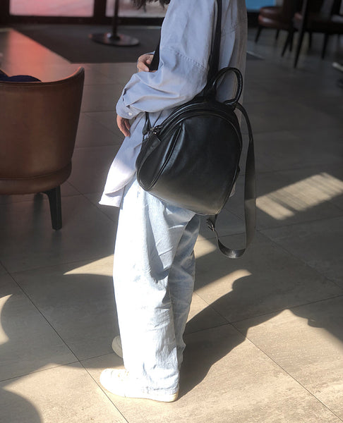 Black Mini Leather Backpack Sleek and Minimalist Soft Cowhide Daypack for Urban Women Minimalist