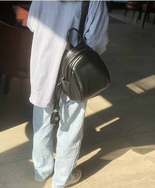 Black Mini Leather Backpack Sleek and Minimalist Soft Cowhide Daypack for Urban Women Professional