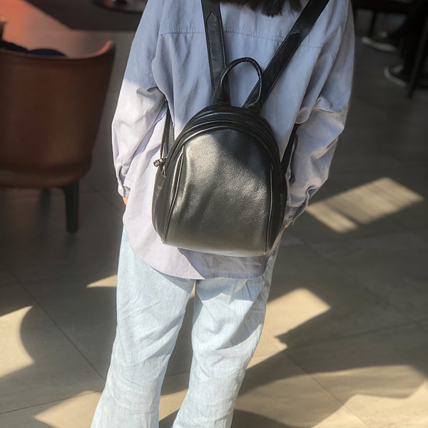 Black Mini Leather Backpack Sleek and Minimalist Soft Cowhide Daypack for Urban Women Trendy