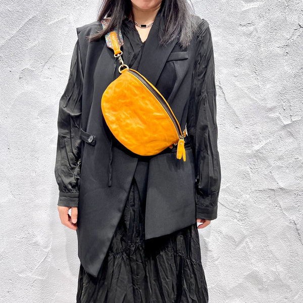 Women's Leather Chest Sling Bag with Boho Shoulder Strap Design Brown