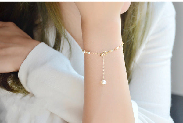 Ladies Charm 14K Gold Bracelet