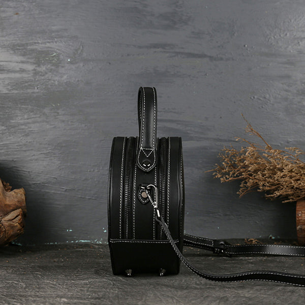 Small Womens Ttooled Leather Circle Bag Round Leather Crossbody Bag For Women Designer