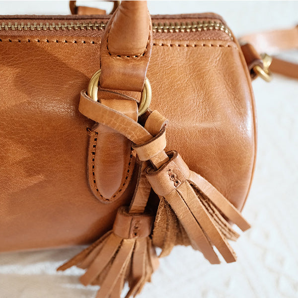 Womens Vintage Genuine Leather Cylinder Crossbody Bag Tassel Barrel Shoulder Bag Designer