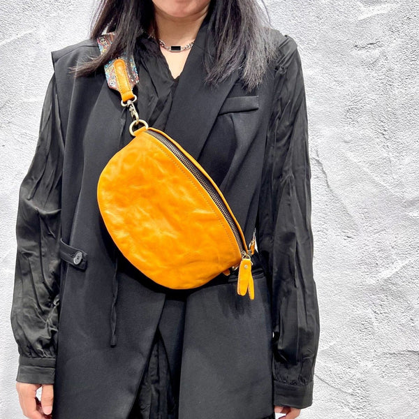 Women's Leather Chest Sling Bag with Boho Shoulder Strap Design Brown