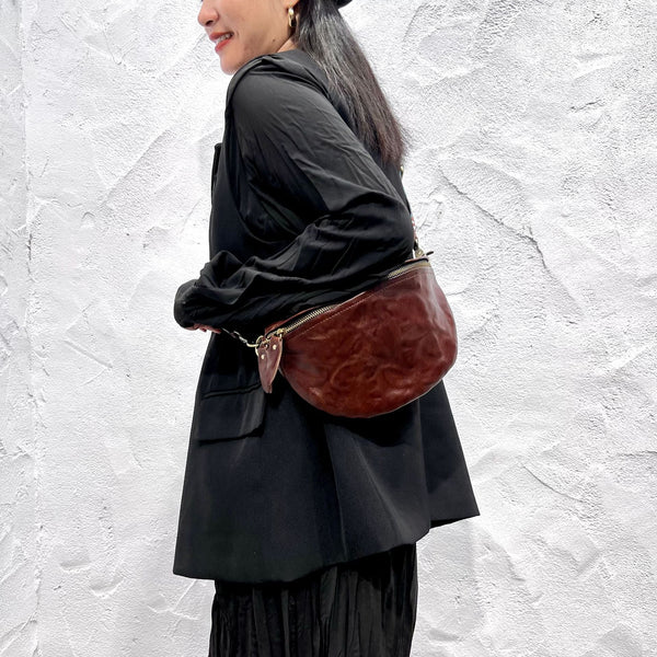 Women's Leather Chest Sling Bag with Boho Shoulder Strap Design Designer